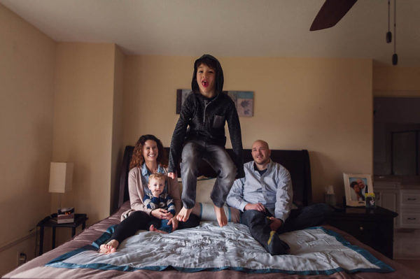 family jumping on bed photography thao lai